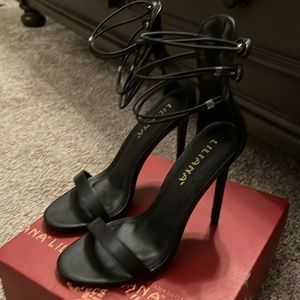Black strappy heels.